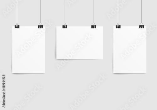 Poster template of a paper sheet. Collection empty paper frame mockup hanging with paper clip. Isolated on white background. Vector illustration.