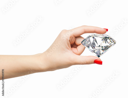 Woman hand holding big 3d diamond on white background with manicured red nails