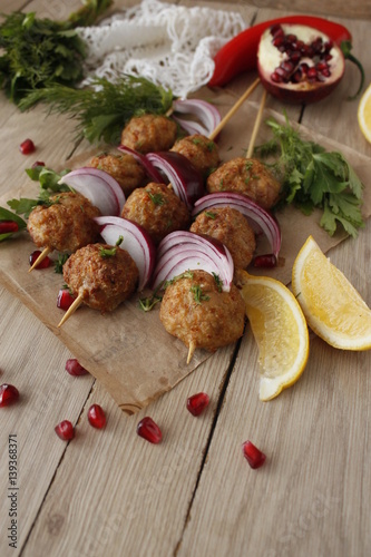 Kofta skewers, meatballs and red onion delicious oriental cuisine, top view