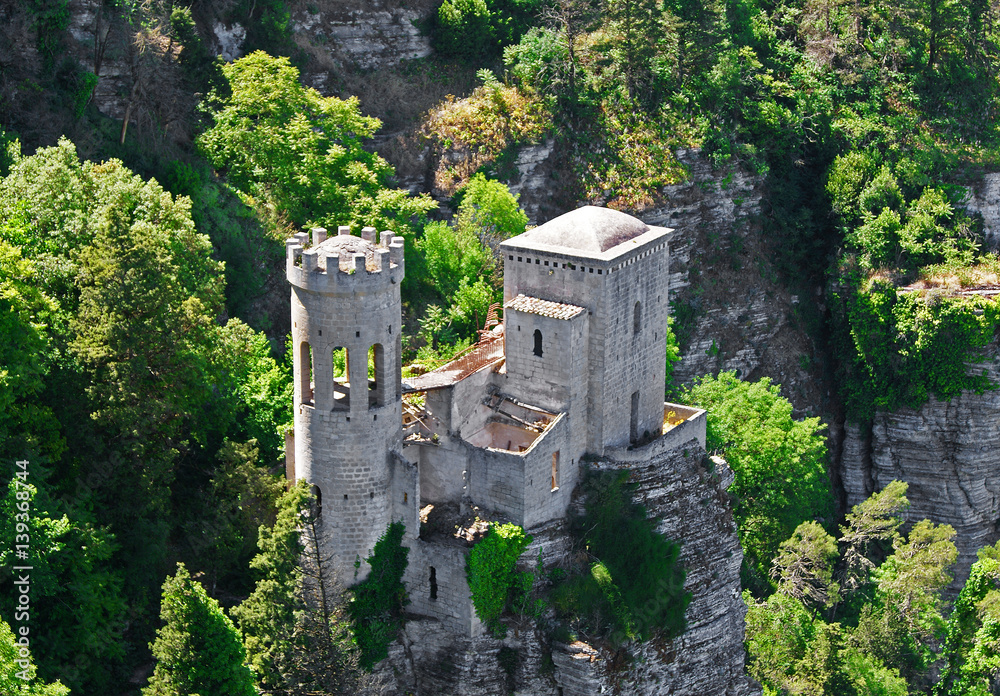 ruins of a old  fortified castle on a rock