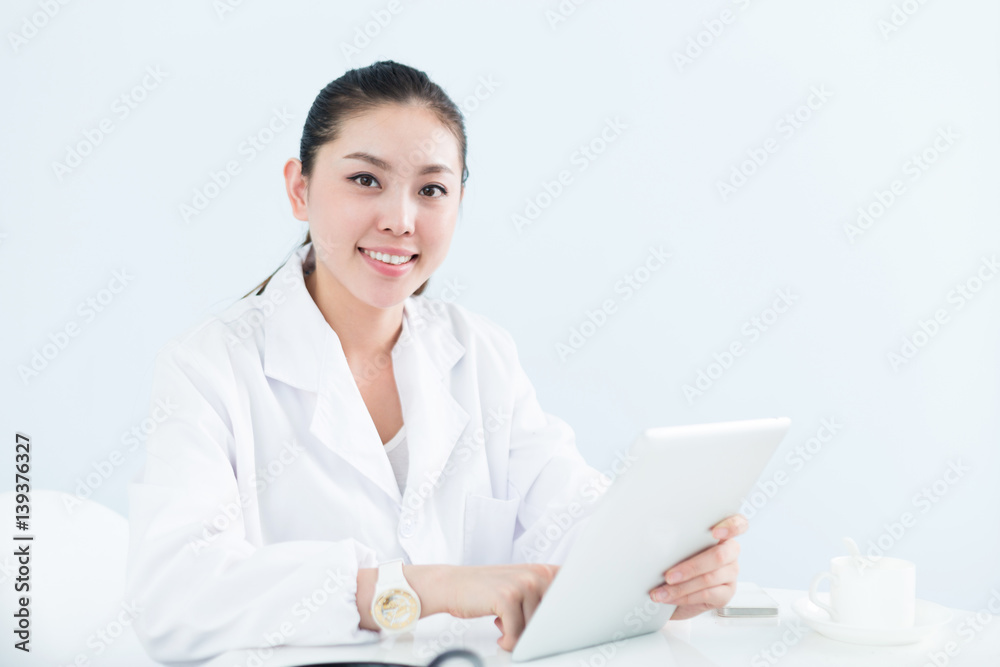 young pretty woman doctor in clinic young pretty woman doctor in clinic