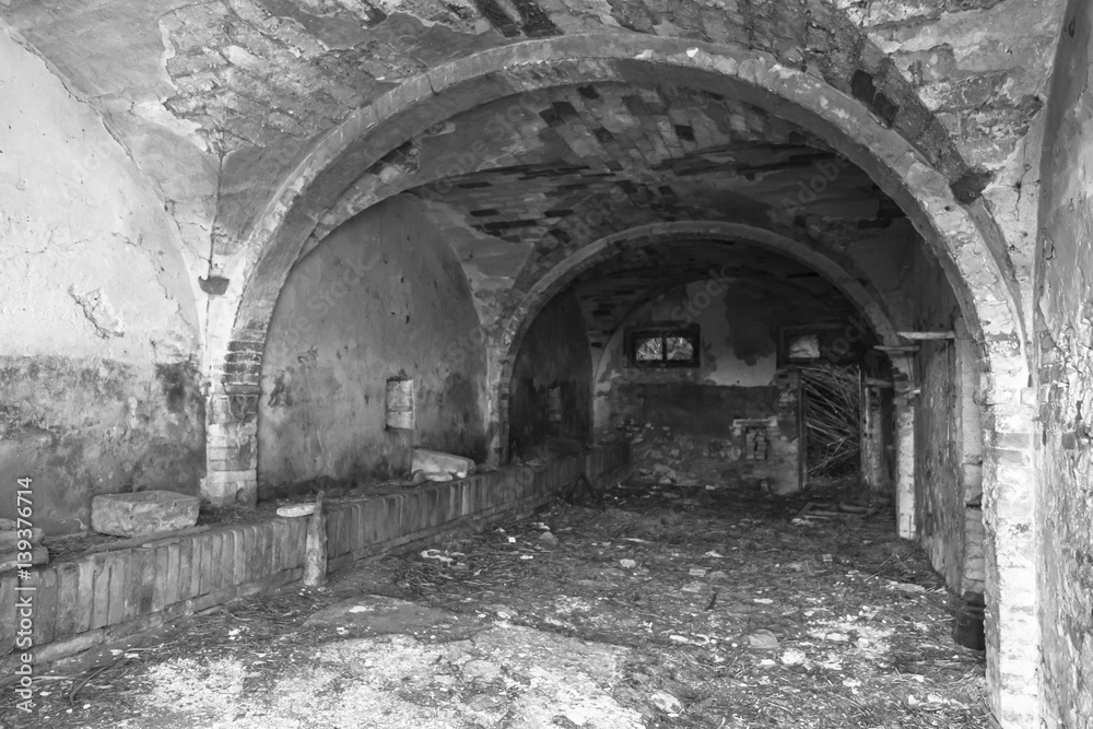 black and white interior view of an abandoned house
black and white interior view of an abandoned house