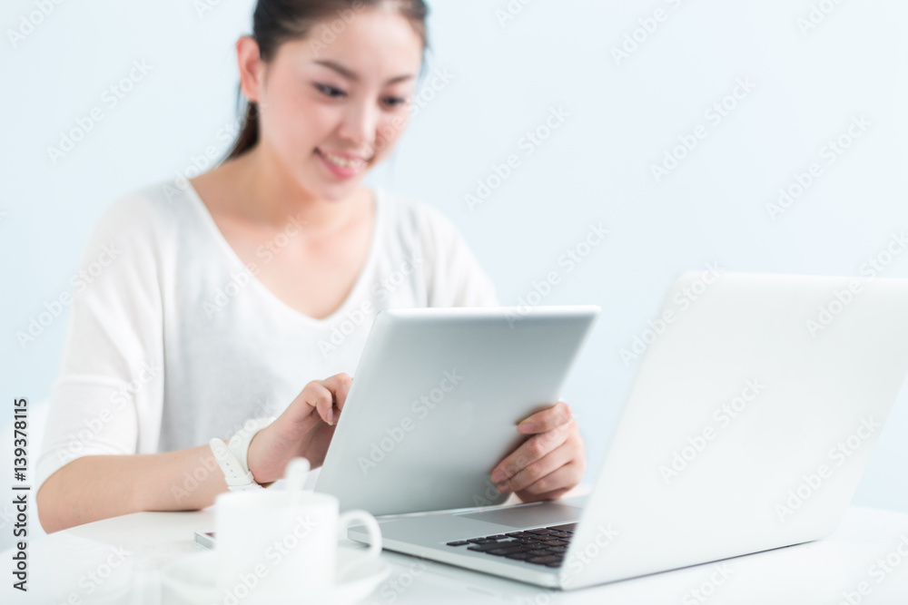 young pretty woman using laptop in office young pretty woman using laptop in office