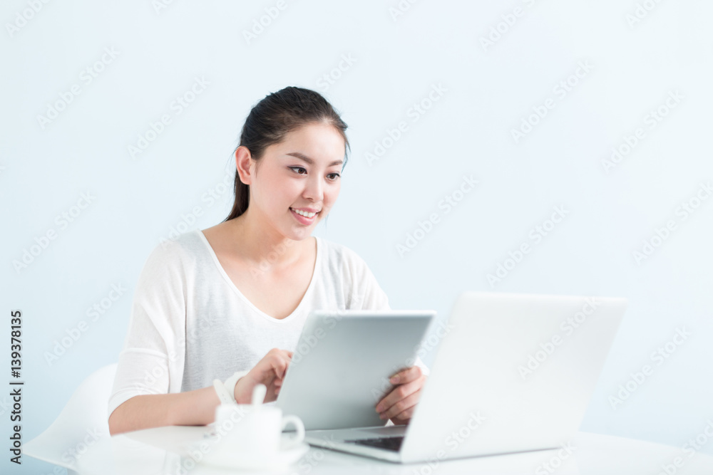 young pretty woman using laptop in office young pretty woman using laptop in office