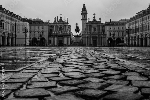 Turin (Torino), Italy - February 15, 2017: Big cobblestone (stones) of the Piazza San Carlo royal square in Turin (Torino), Italy- black and white version 
