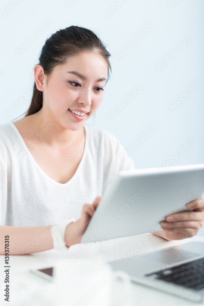 young pretty woman using laptop in office young pretty woman using laptop in office