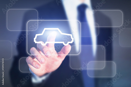 choosing car online concept, businessman pressing button on virtual screen to buy or rent