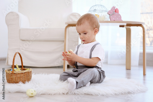 Cute little baby playing wi...
