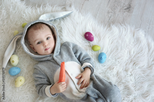 Cute little baby in bunny c...