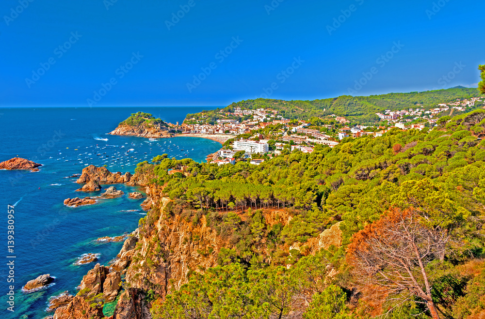 View of Costa Brava coastline and town of Tossa de Mar, Spain