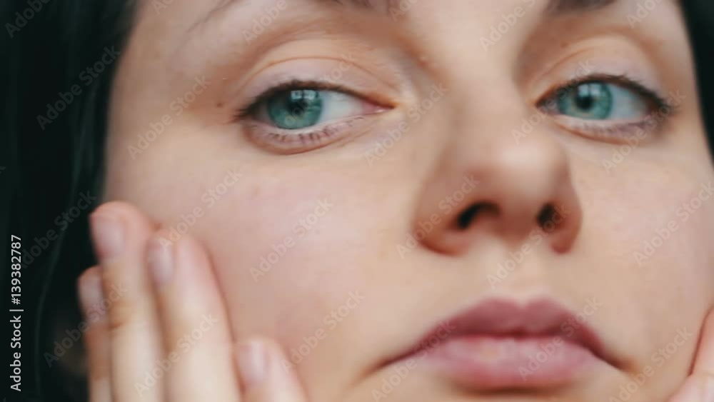 Beauty portrait of woman hand touching face skincare concept Beauty portrait of woman hand touching face skincare concept