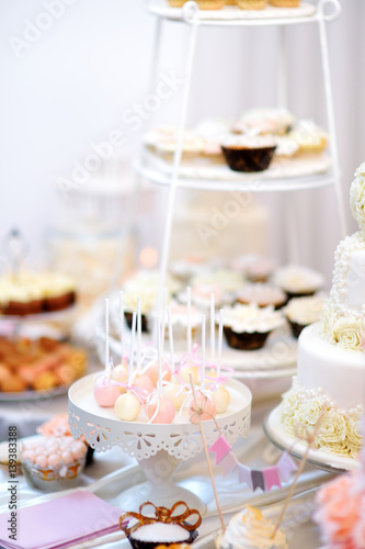 Beautiful desserts  sweets and candy table at wedding reception