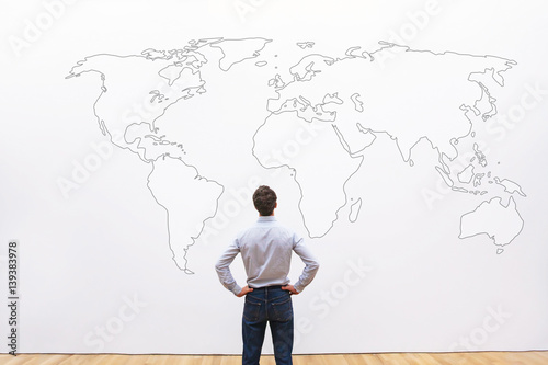 businessman looking at the world map, international career opportunity concept, business background