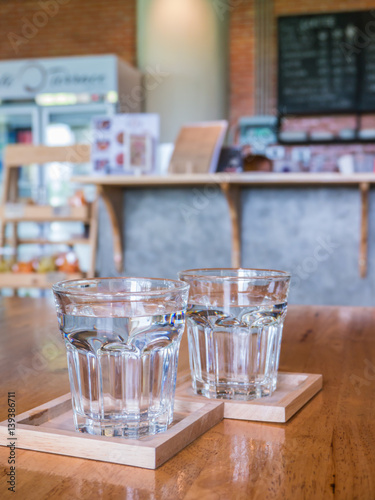 Glasses of water on a table in a coffee shop. Drinking water in a glass.