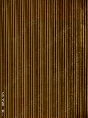 Fototapeta Naklejka Na Ścianę i Meble -  Golden corrugated metal - background / pattern