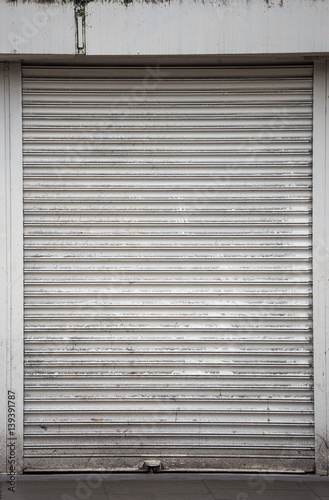 Metal rolled store door
