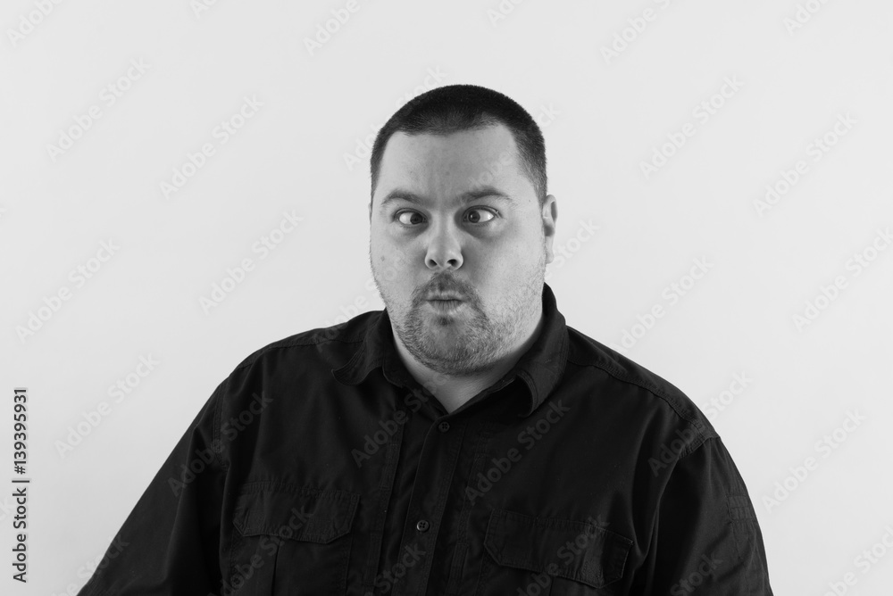 Nice Image of Cross Eyed Middle Aged Man in Black and White. Nice Image of Cross Eyed Middle Aged Man in Black and White.