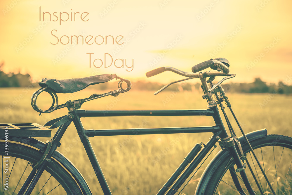 beautiful landscape image with Bicycle at sunset in vintage tone style beautiful landscape image with Bicycle at sunset in vintage tone style
