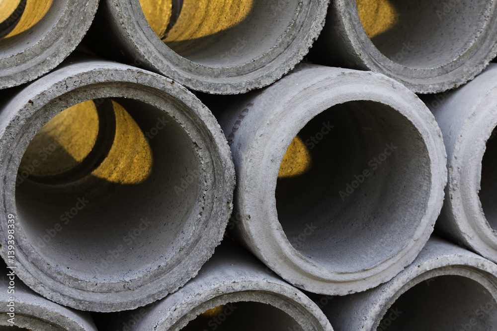 Cement pipes closeup for construction water system. Cement pipes closeup for construction water system.