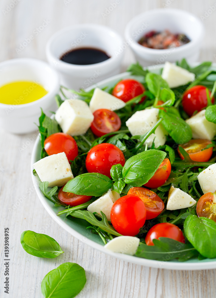 Vegetarian salad with cherry tomato, mozzarella and rucola Vegetarian salad with cherry tomato, mozzarella and rucola
