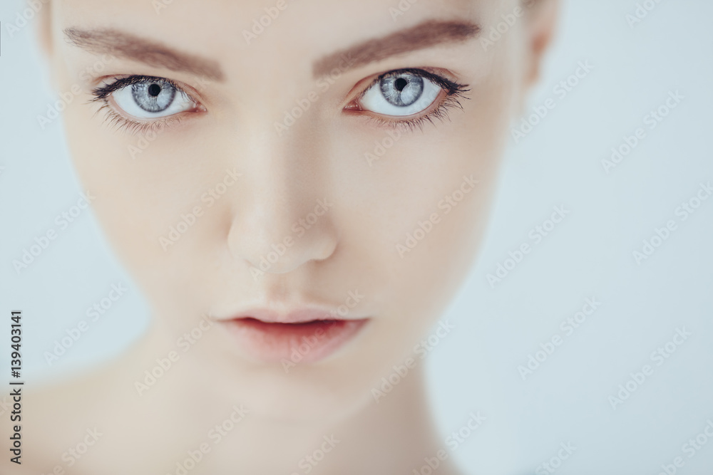 Beautiful face of young teen woman with clean fresh skin. Beautiful face of young teen woman with clean fresh skin.