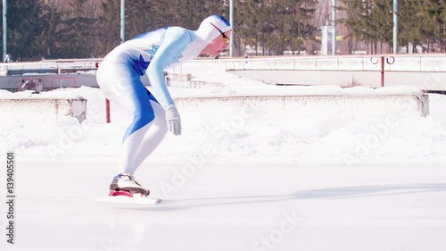 Speed ice skater skating on outdoor race HD slow-motion video. Professional athlete training for winter olympic