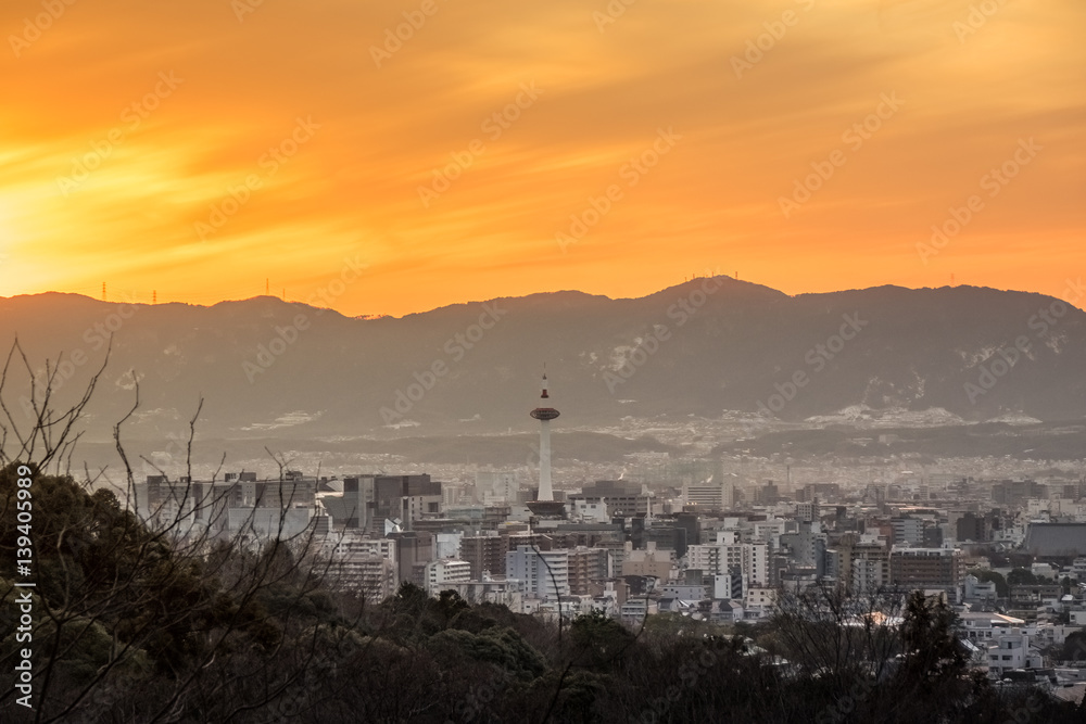 Kyoto City at golden hour with Kyoto Tower in the middle of a frame, Kyoto, Japan