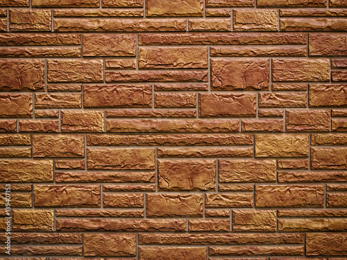 Old yellow wall, built of r...