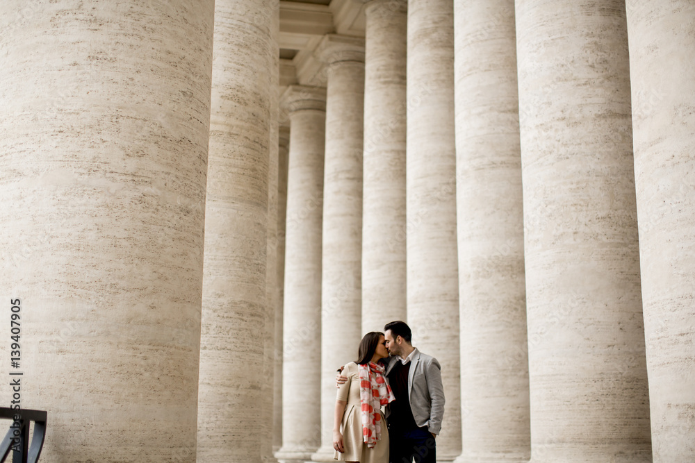 Loving couple at the St. Peter's Square in Vatican Loving couple at the St. Peter's Square in Vatican