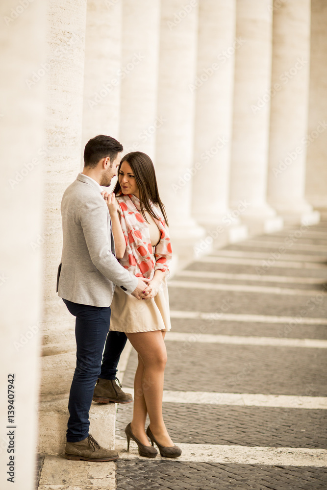 Loving couple at the St. Peter's Square in Vatican Loving couple at the St. Peter's Square in Vatican
