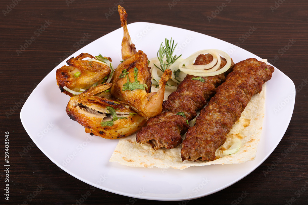 Beef kebab and grilled Quail Beef kebab and grilled Quail