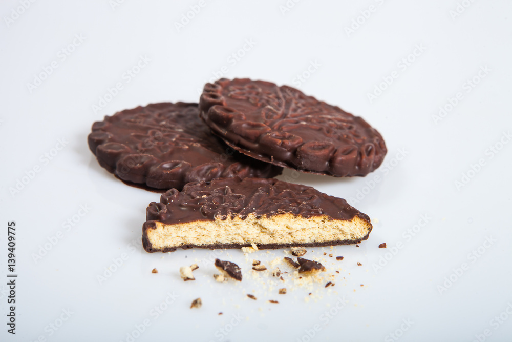 Fototapeta premium Cookies in chocolate glaze on a light background