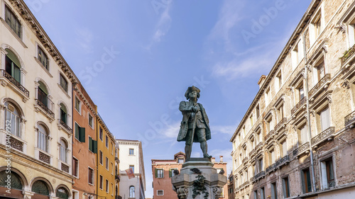 The statue of Carlo Goldoni in Campo San Bortolomio square, San Marco district, Venice, Italy photo