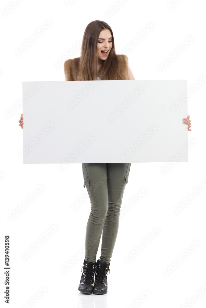 Surprised Causal Woman Holds White Placard