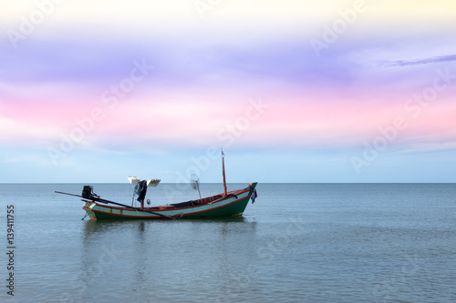Fishing boats on the beach © noppharat