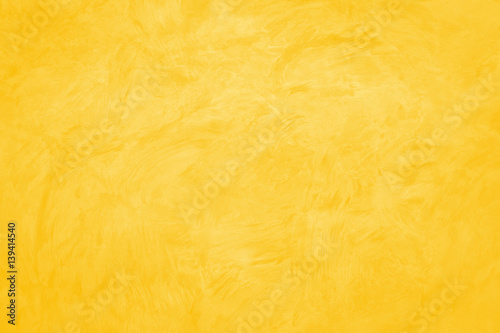 Gold concrete wall on background texture