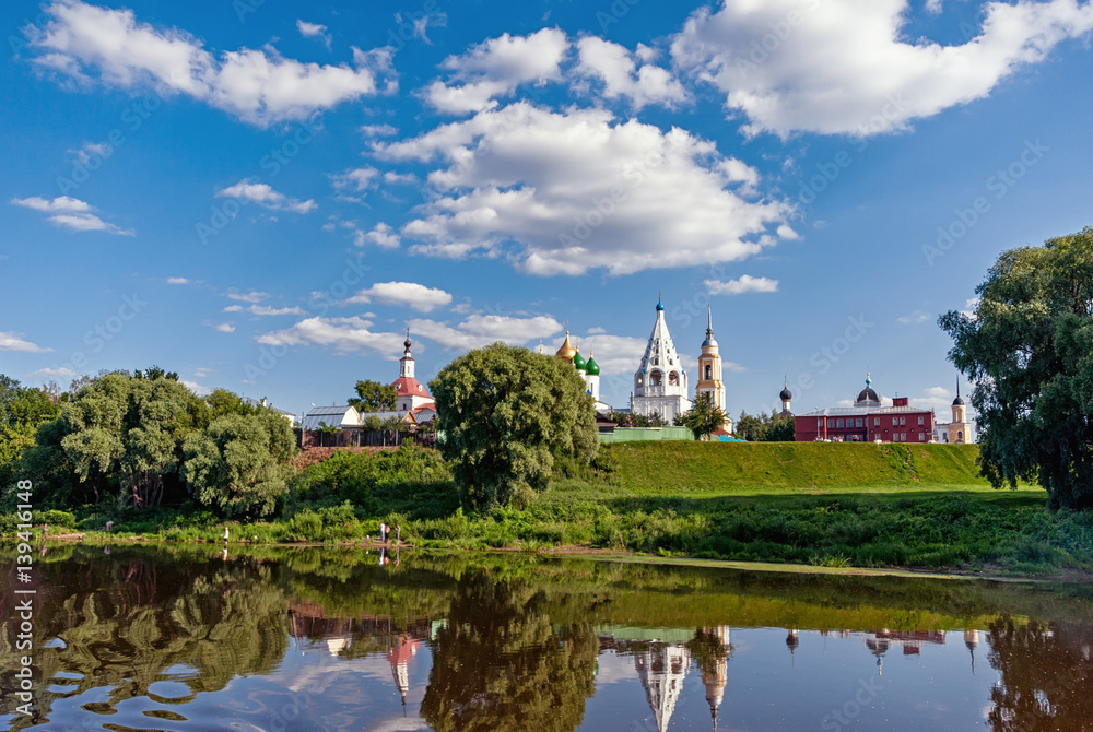 Church buildings in a Sunny cloudy day on the banks of the Moscow river City Kolomna Moscow region