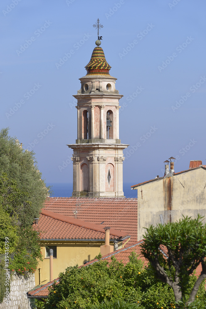 Tower bell of baroque Basilica of Saint Michel Archange at Menton, a commune in the Alpes-Maritimes department in the Provence-Alpes-Côte d'Azur region in southeastern France.
