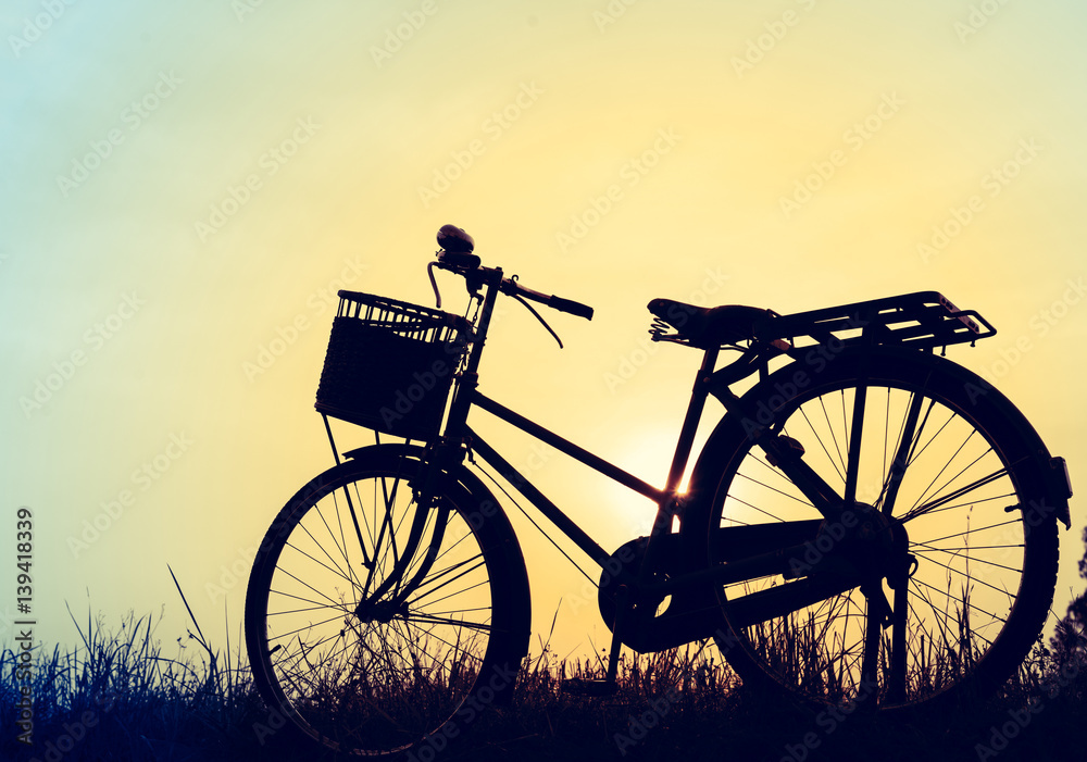 beautiful landscape image with silhouette Bicycle at sunset beautiful landscape image with silhouette Bicycle at sunset