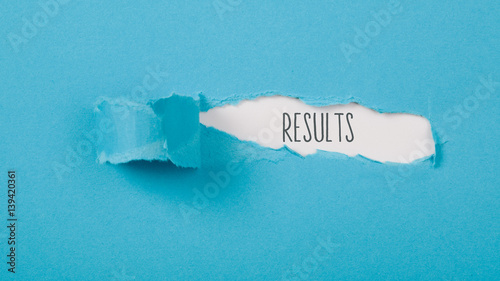 Results message on Paper torn ripped opening photo