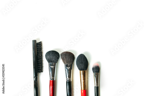 Top view professional make-up brushes isolated white background