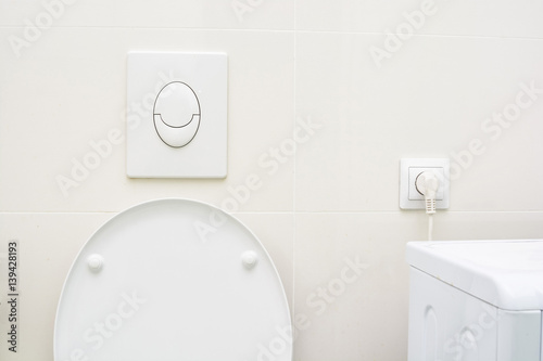 Lavatory pan with push button