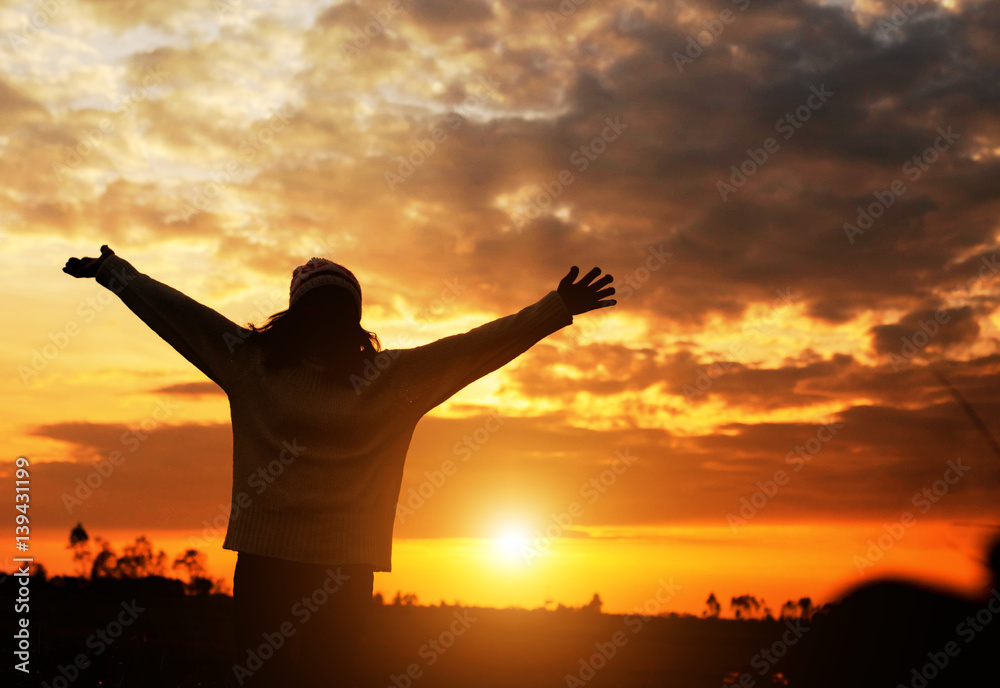 Young woman relaxing in summer sunset sky outdoor. People freedom style.