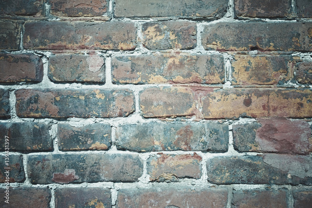 Fototapeta premium Background of old red brick wall pattern texture. Macro shot.