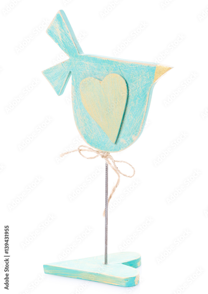 Handmade wooden bird on stick isolated