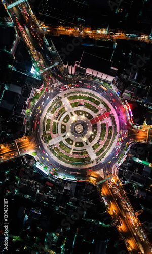 Road roundabout with car lots Wongwian Yai in Bangkok Thailand. street large beautiful downtown at evening light.  Aerial view   Top view  cityscape  Rush hour traffic jam