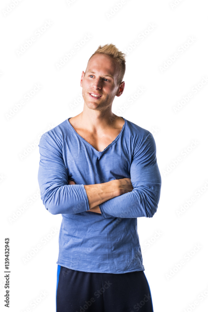 Fit handsome young male model posing confident, isolated on white Fit handsome young male model posing confident, isolated on white