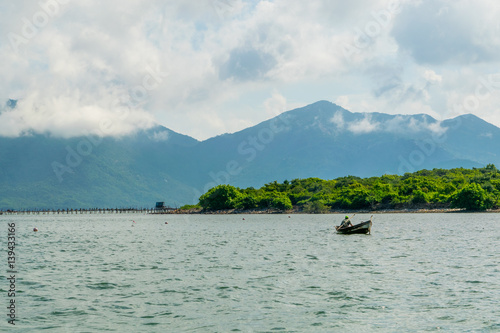 Sea landscape with boats near island shore - the South China sea - Vietnam Nha Trang bay
