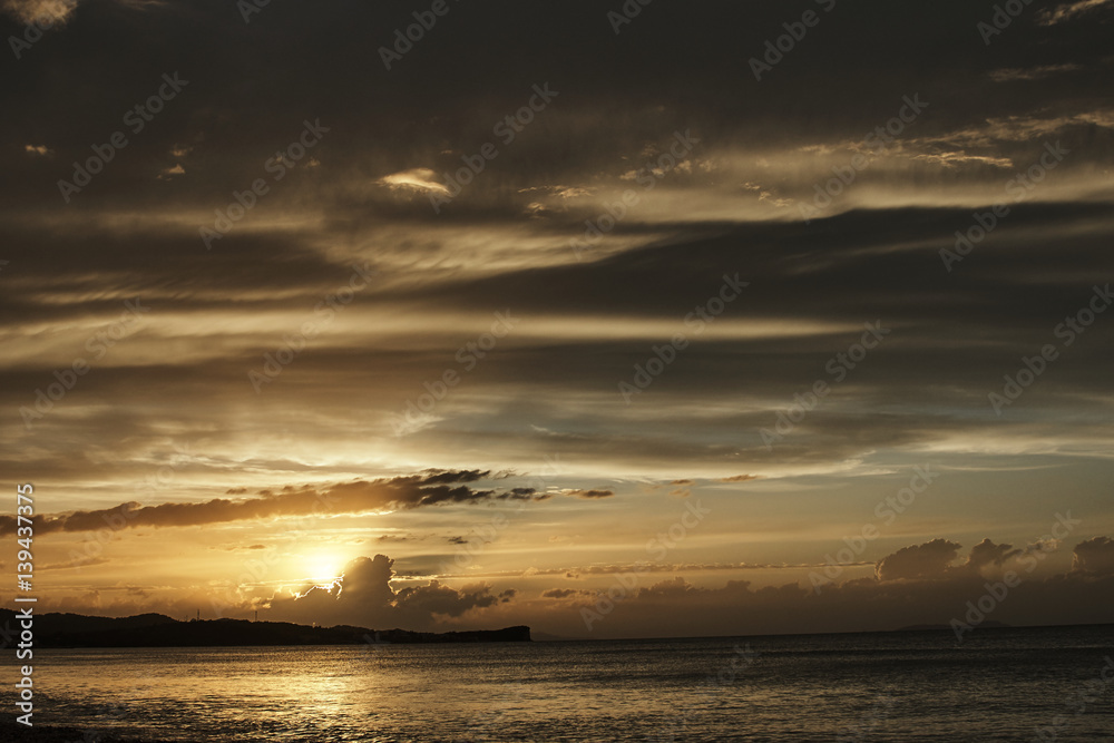 Sunset on the beach of the island of Corfu in Greece. Sunset on the beach of the island of Corfu in Greece.
