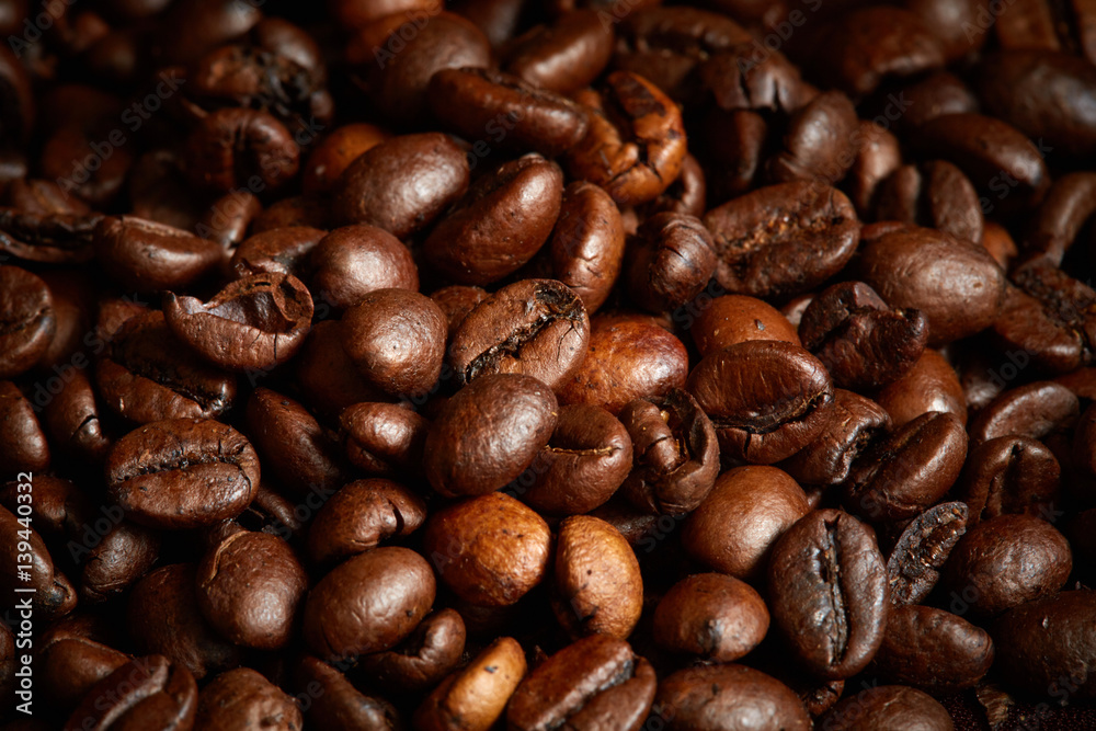 Close up of Roasted coffee beans on the sun Close up of Roasted coffee beans on the sun